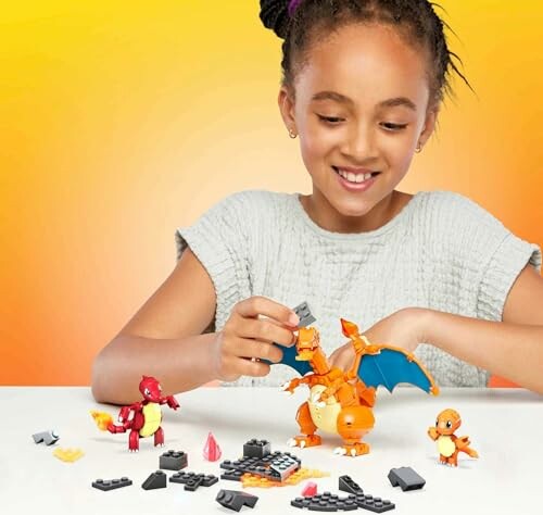Kind bouwt draak met Lego-stenen