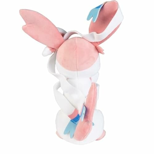 Roze en wit pluche speelgoedfiguur met lange oren