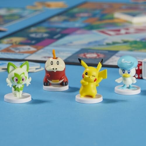 Speelgoedfiguren van Pokémon op een bordspel