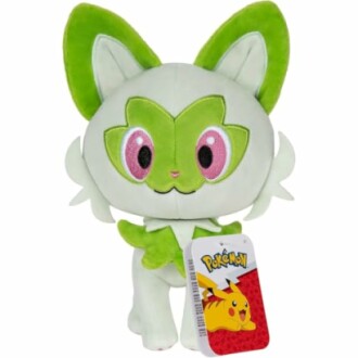 Pluche speelgoed van een groene katachtige Pokémon met label.