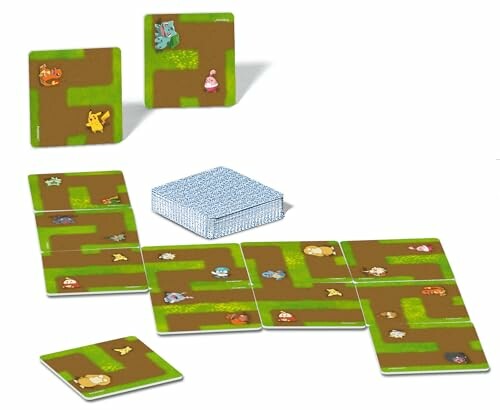 Pokémon dominospel op tafel met kaarten en stapel