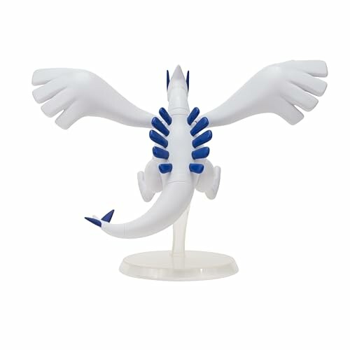 Witte draak figuur met blauwe accenten op standaard.